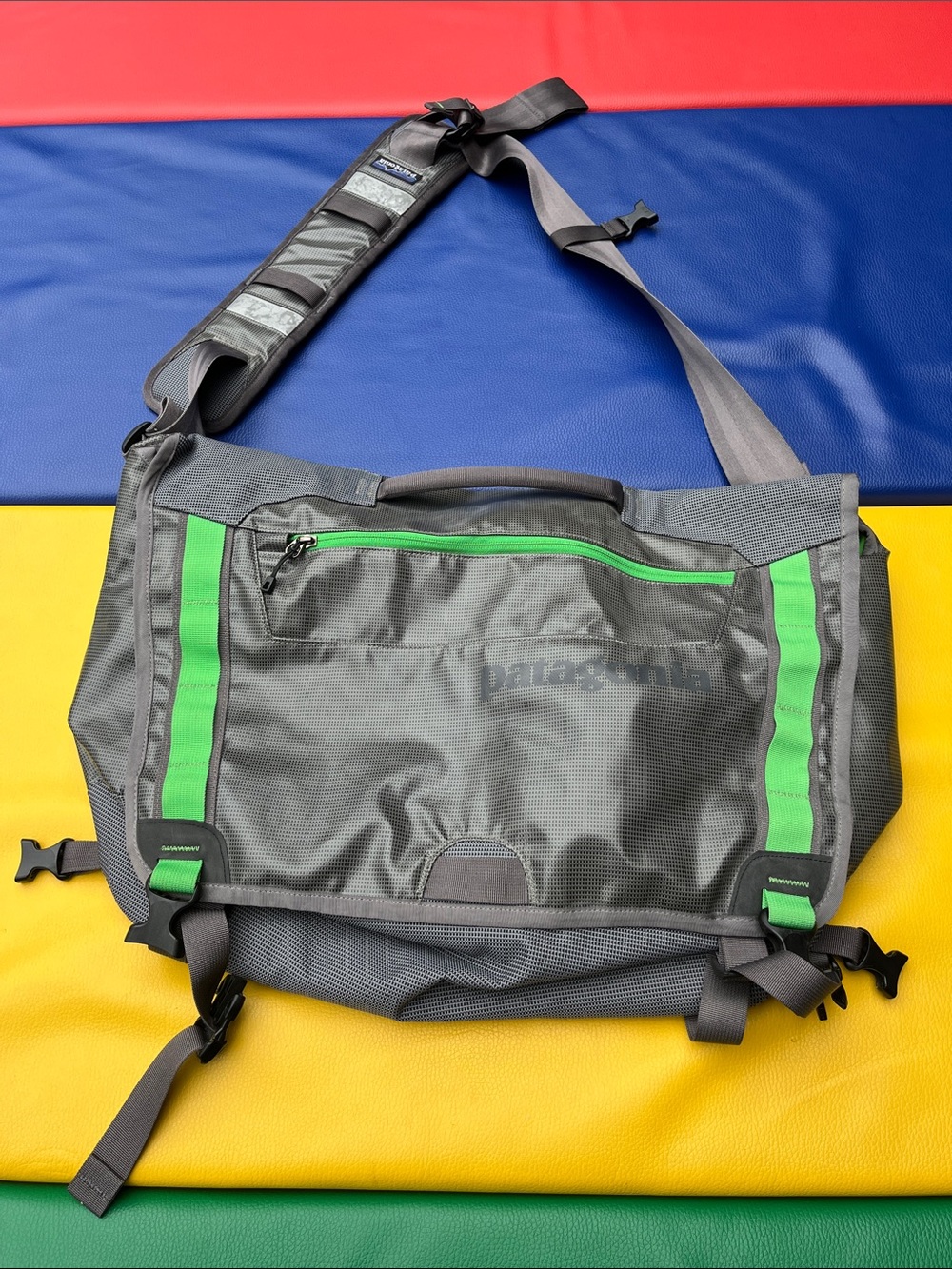 Patagonia’s Gray Messenger Bag with Green Accents older black hole